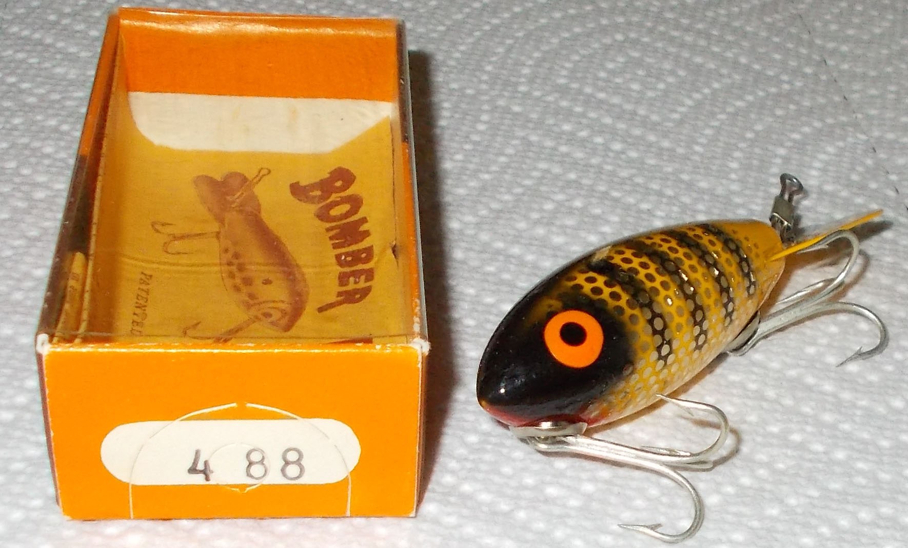 Sold at Auction: Wood bomber lure