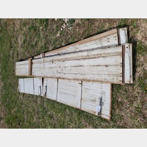 Antique grain sides form a 4 wheel hay trailer