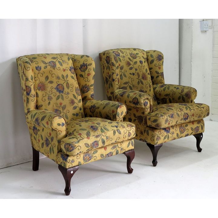 PAIR OF UPHOLSTERED WINGBACK CHAIRS