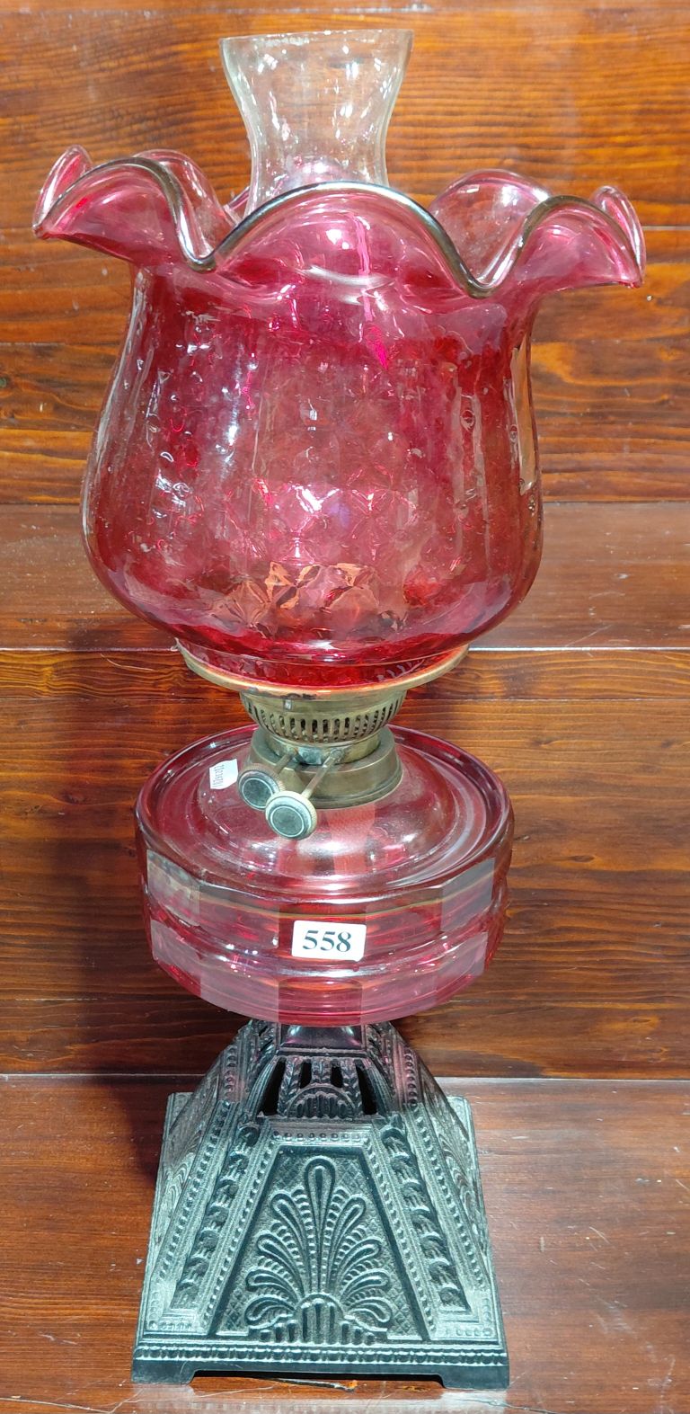 558 · VINTAGE CRANBERRY GLASS OIL LAMP