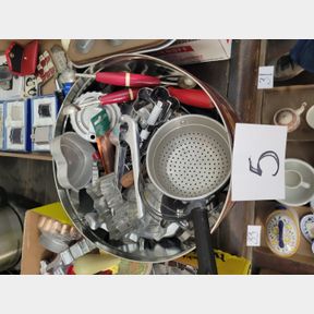 Various cookie cutters and vintage kitchen utensils
