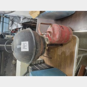 Portable BBQ grill and heavy galvanized fuel can