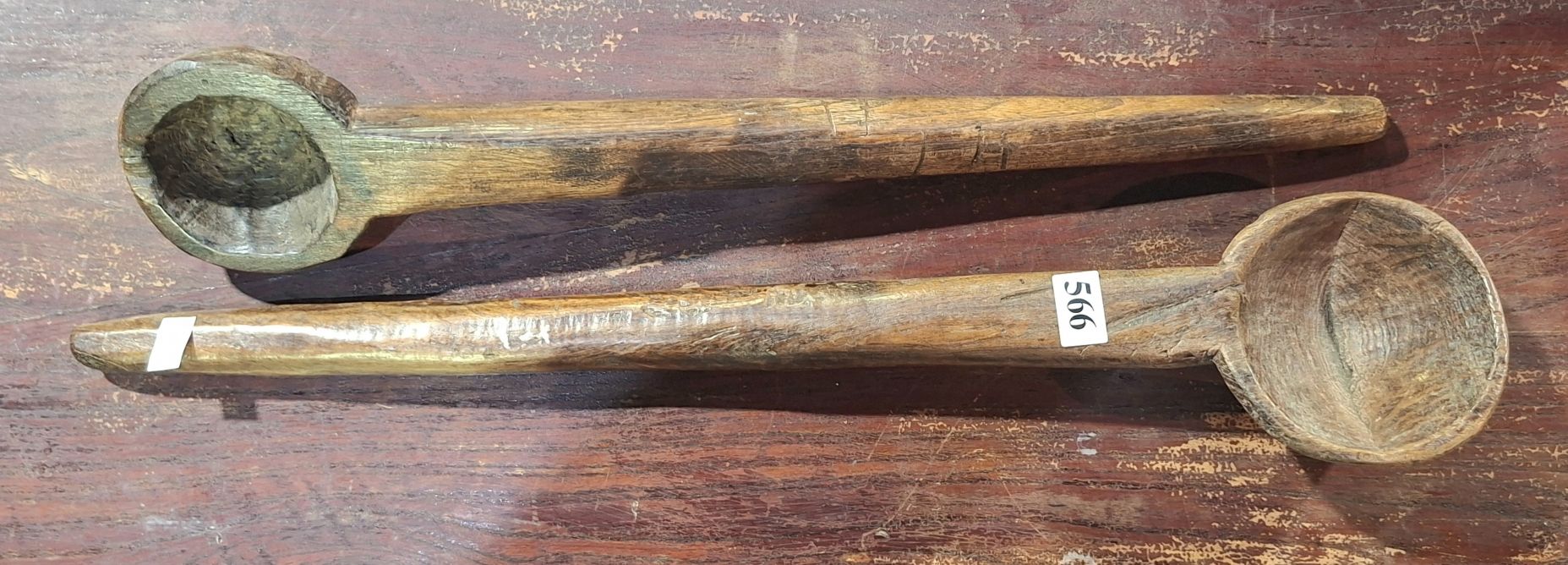 566 · TRIBAL WOODEN LADLES
