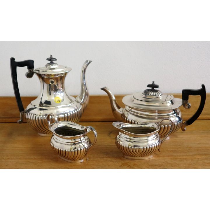 A MID 20TH CENTURY SILVERPLATED FOUR PIECE TEA SERVICE,