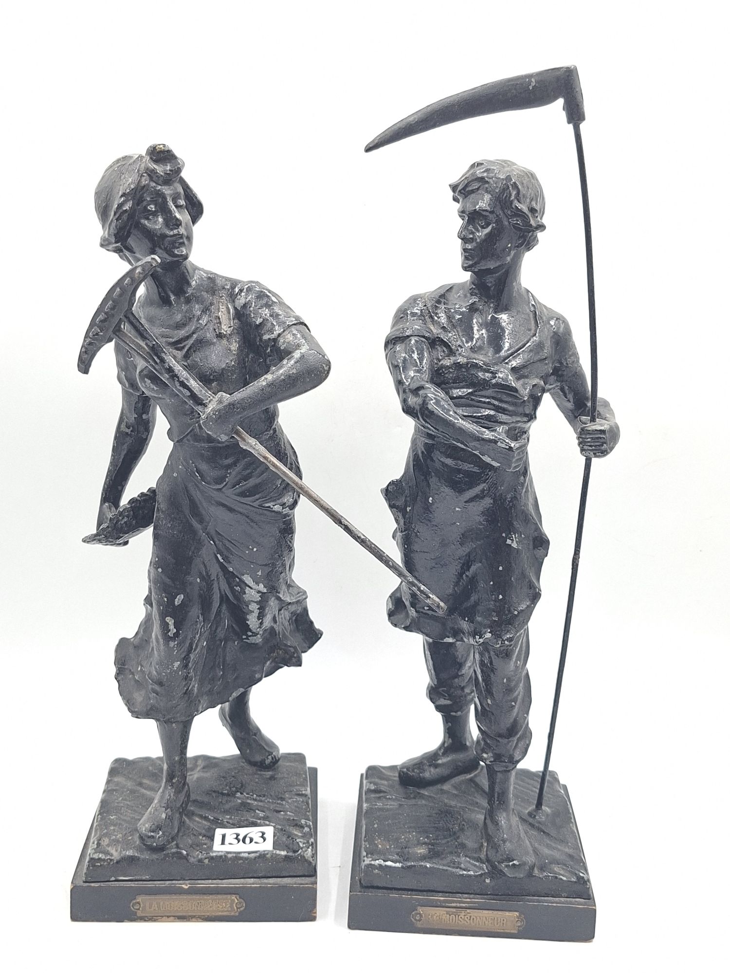 A PAIR OF HARVEST WARE STATUES