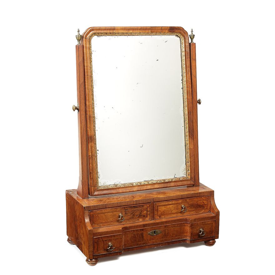 A George I walnut, crossbanded and featherbanded toilet mirror
