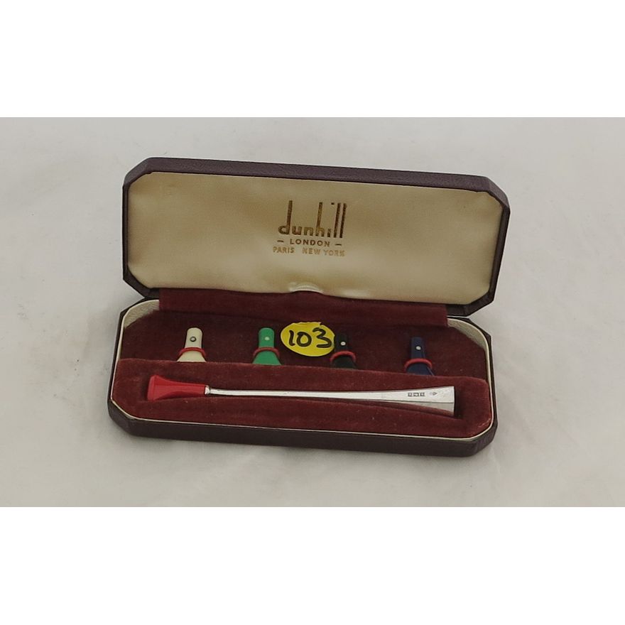 A CASED DUNHILL SILVER CIGARETTE HOLDER,