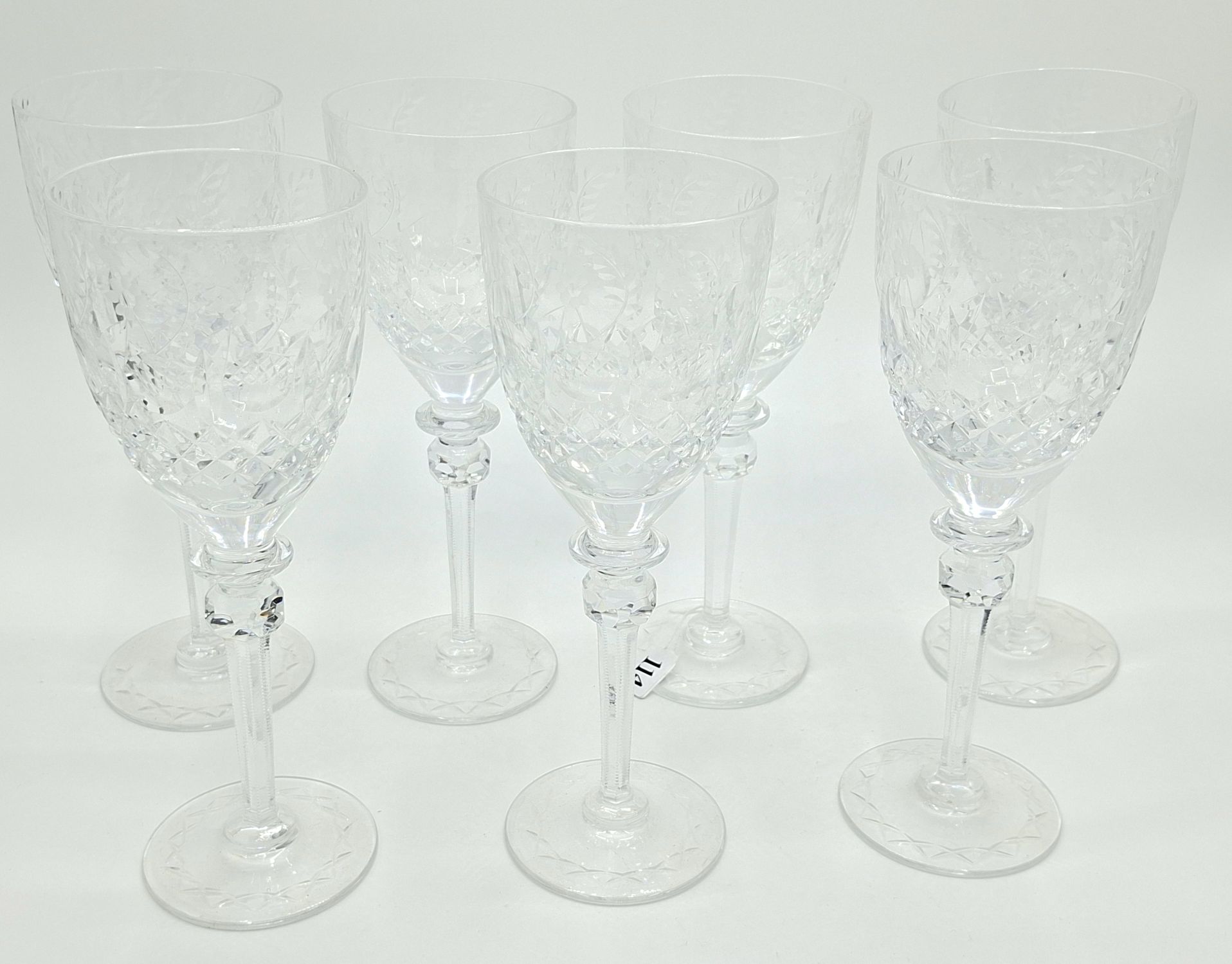 114 · A SUITE OF CUT CRYSTAL WINE GLASSES