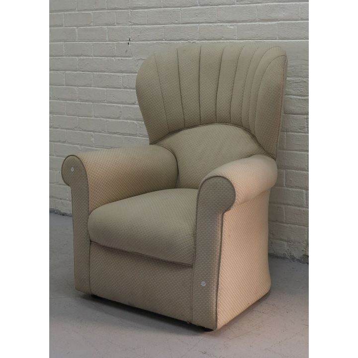 UPHOLSTERED ROCKER