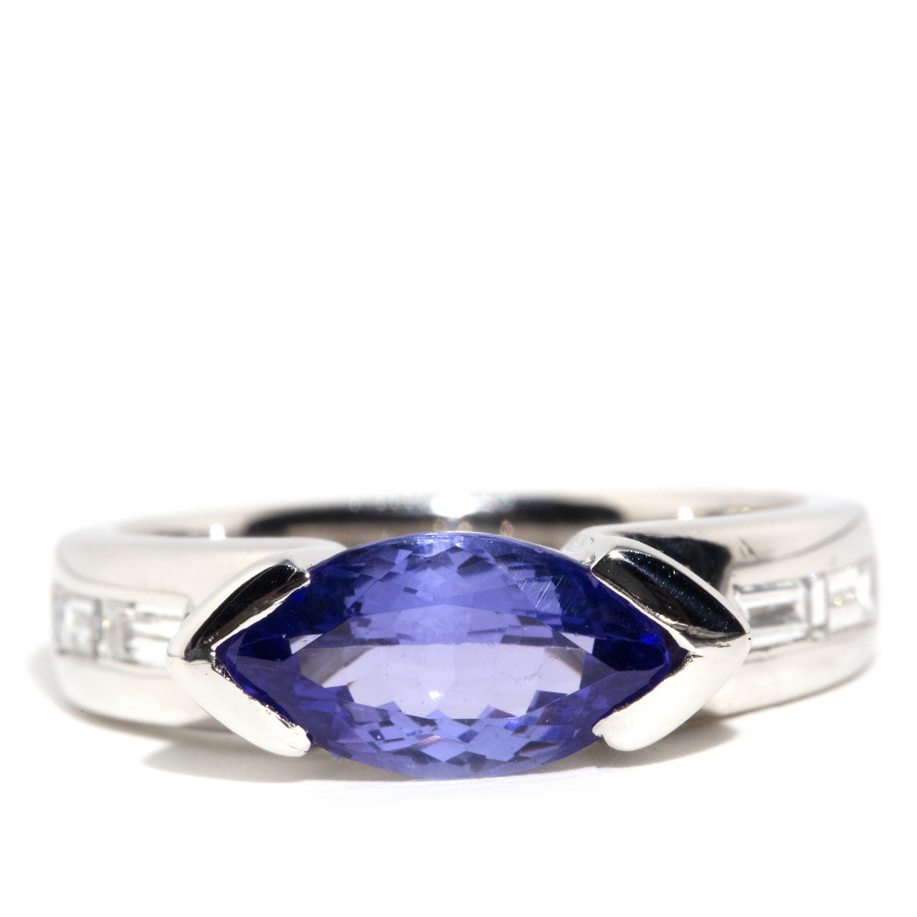155 · 18 Carat Tanzanite and Diamond Ring