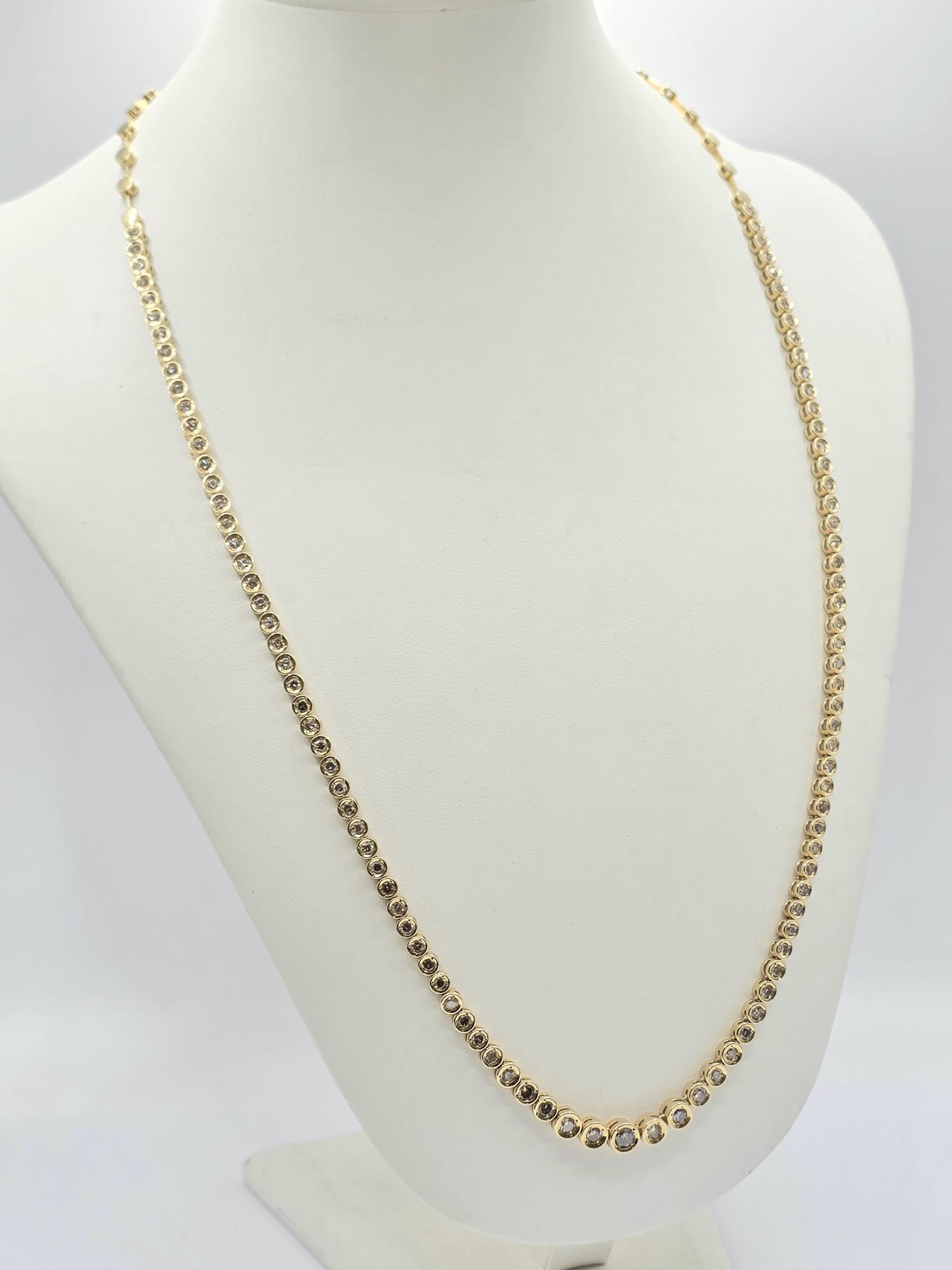 252 · 18K GOLD TENNIS NECKLACE