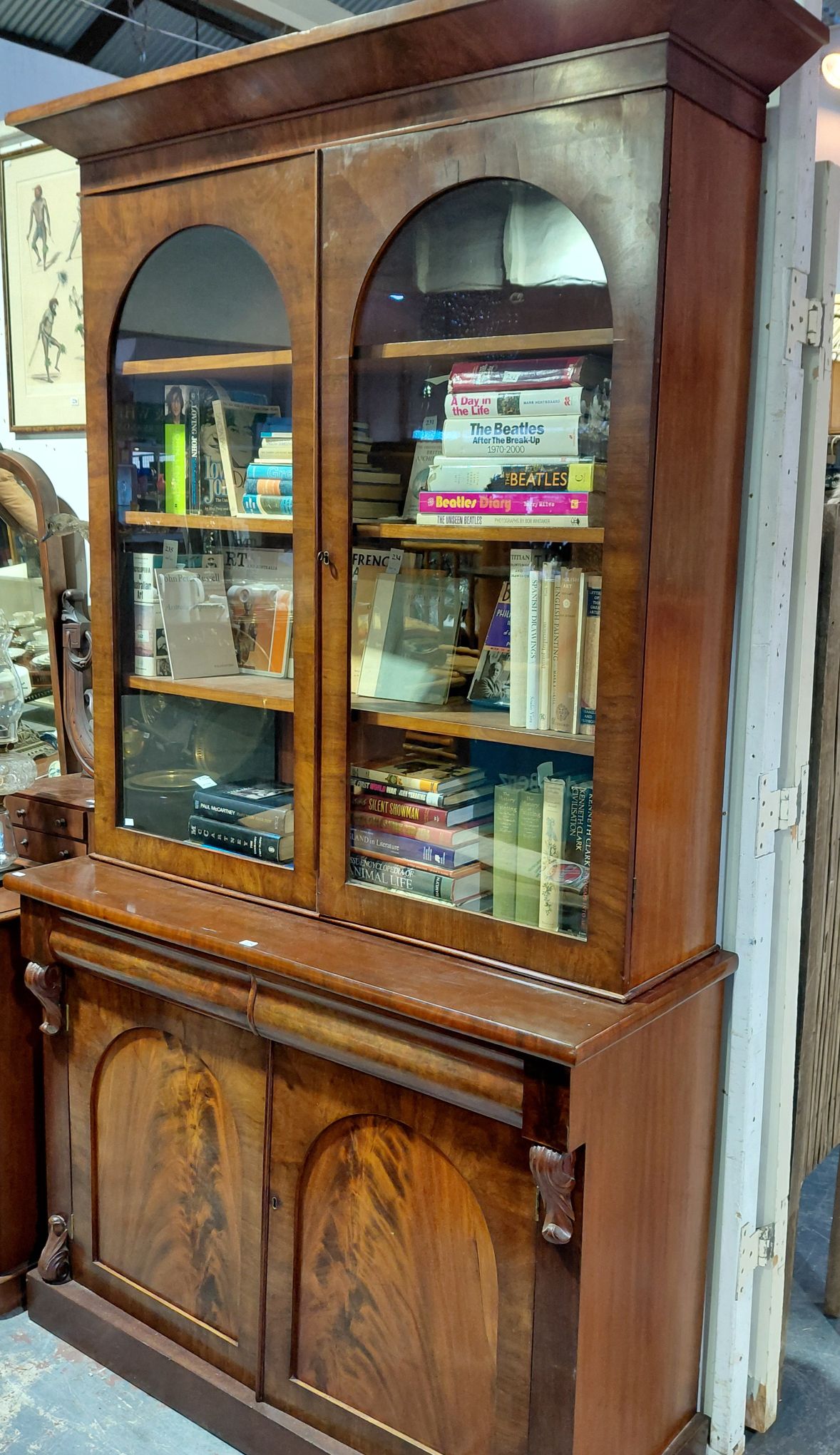 228 · VICTORIAN FLAME MAHOGANY BOOKCASE