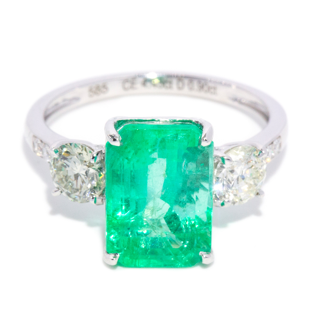 64 · Emerald & Diamond 14ct Gold Ring