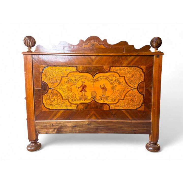 An 19th century German walnut, burr walnut, sycamore and pen work decorated panel, now incorporated