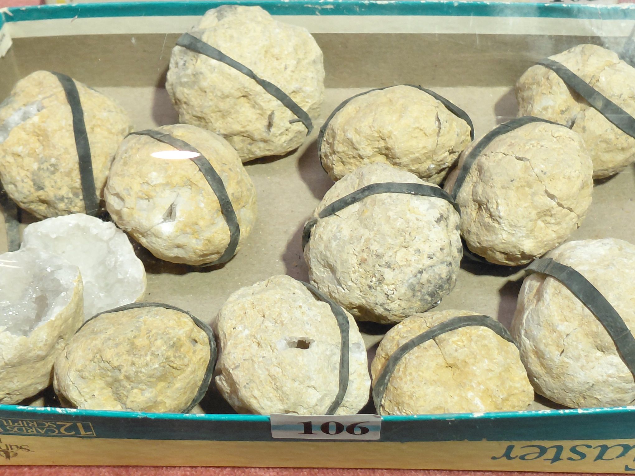 106 · DOZEN SMALL CRACKED GEODES