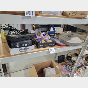 Shelf of clearance items, security system, air pump, clock and other