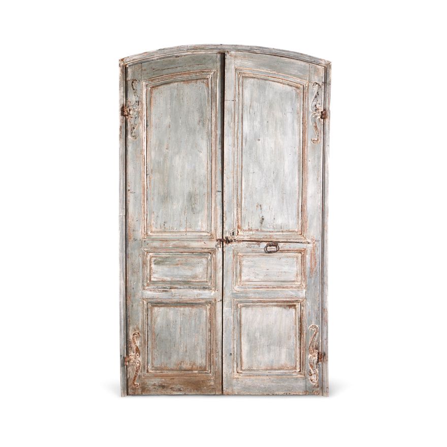 A large pair of 18th century French blue painted 'chateau' doors