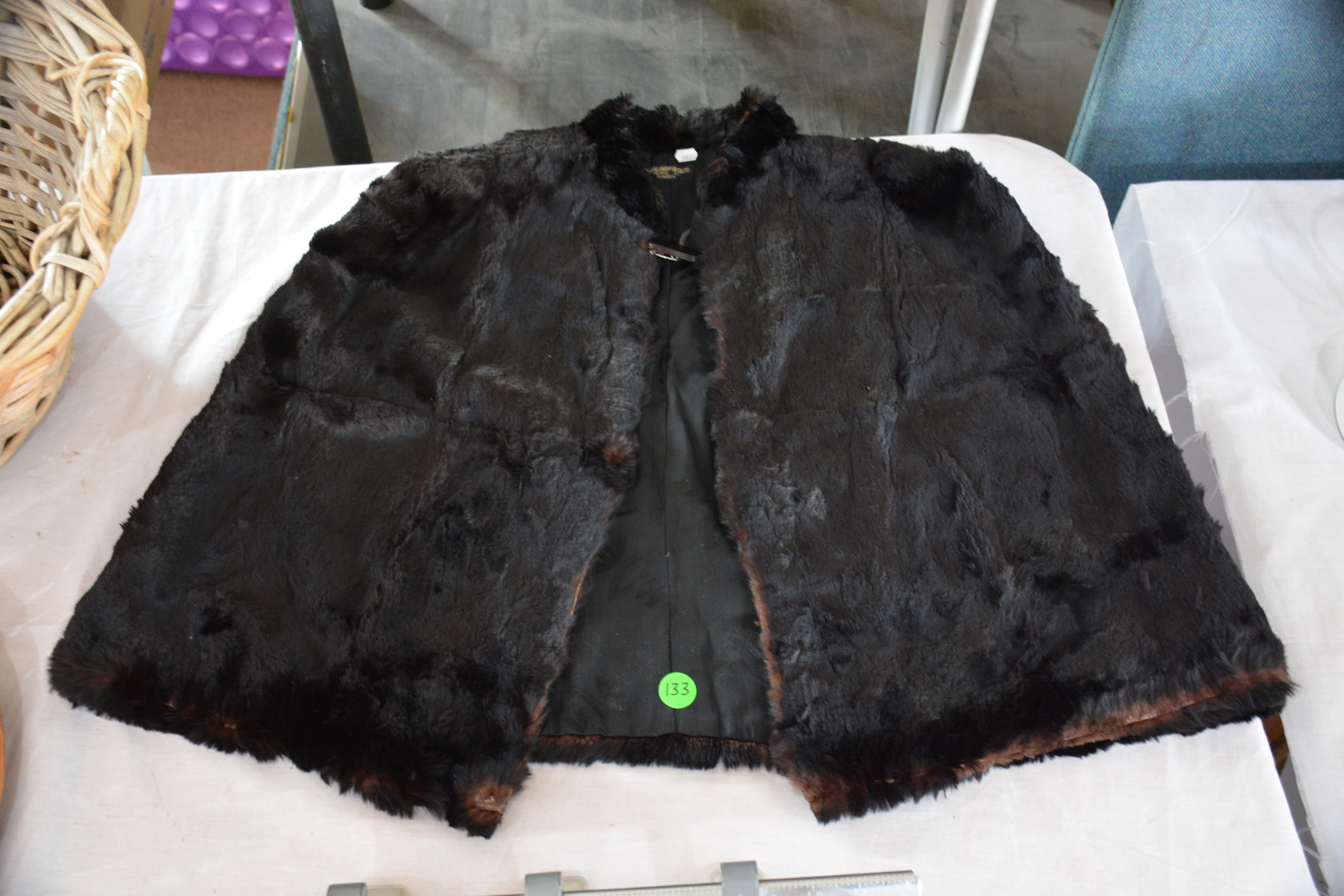 NZ Fur Co. Half Fur Poncho — NZ auction result