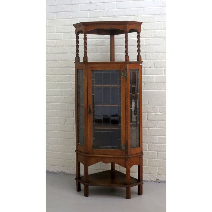 LEAD-GLAZED OAK CORNER CABINET
