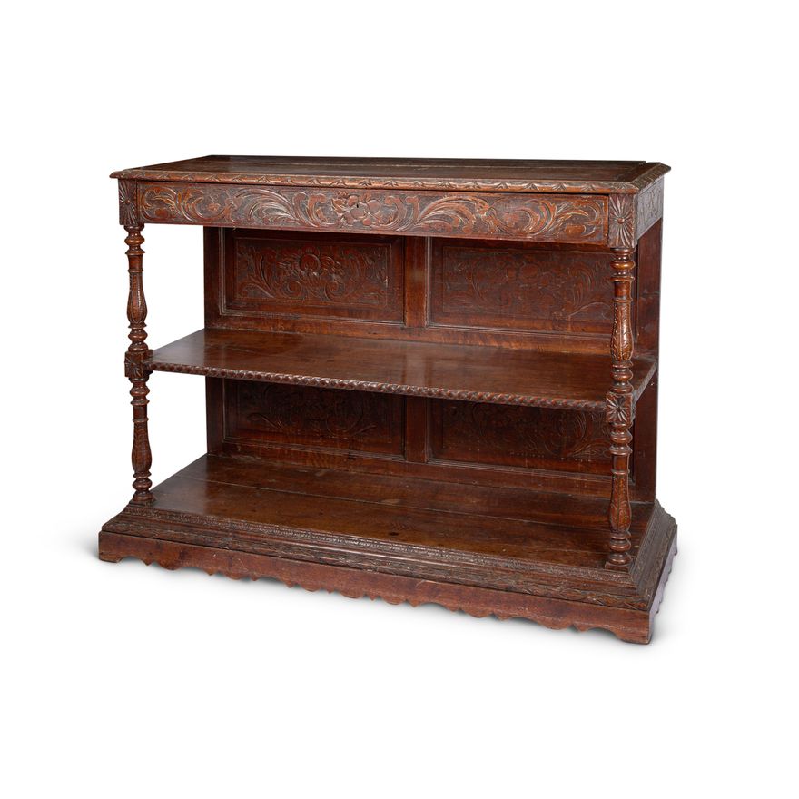 A 19th century carved oak two-tier buffet in the 17th century style