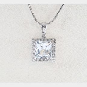 18CTWHITE GOLD PENDANT WITH 0.180CT DIAMONDS & PRINCESS CUT CUBIC - 51929/3383