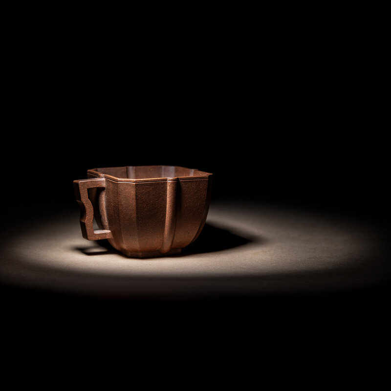 A Rare Yixing Zisha Pottery Octagonal Cup with Impressed