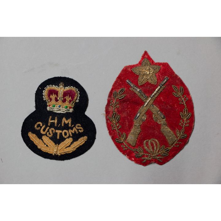 TWO BULLION BADGES