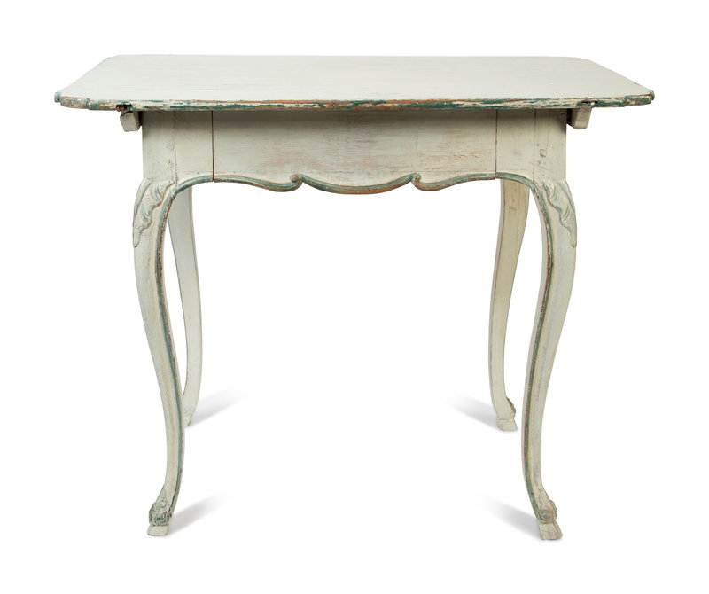 A Swedish Gustavian Style Painted Side Table
Height 29 x width 35 x depth 21 3/4 inches.