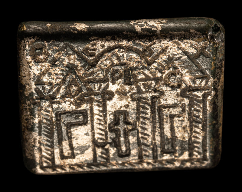 A Byzantine Gilt-Bronze Weight
Length 1 3/16 inches  (3 cm).