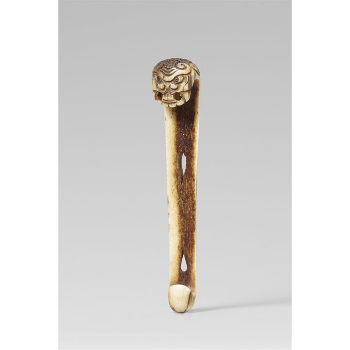 A stag antler sashi netsuke. Late 19th century