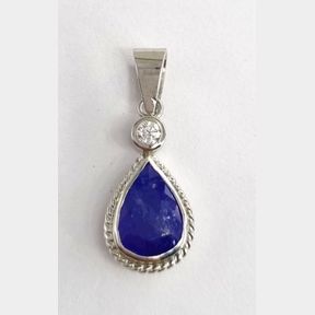 3.527CTS TANZANITE AND 0.100CTS ROUND DIAMOND COLOUR H/I CLARITY VS/SI IN 18CT WHITE GOLD PENDANT