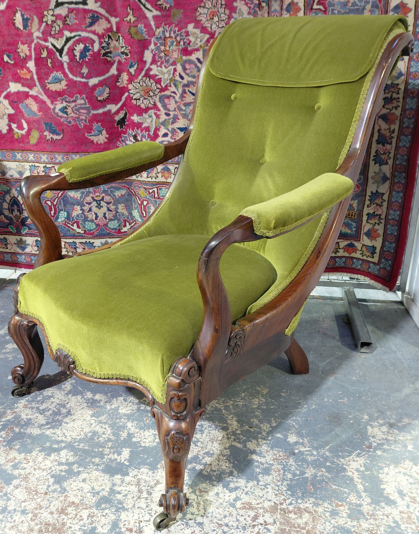 A GENTLEMANS OPEN ARMCHAIR