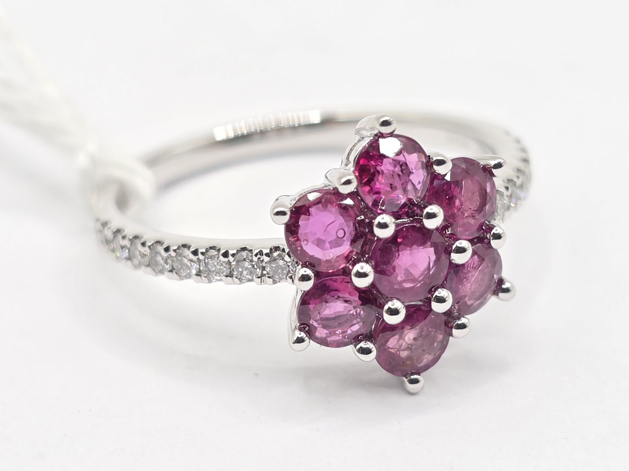 294 · 9CT GOLD RUBY FLORAL RING