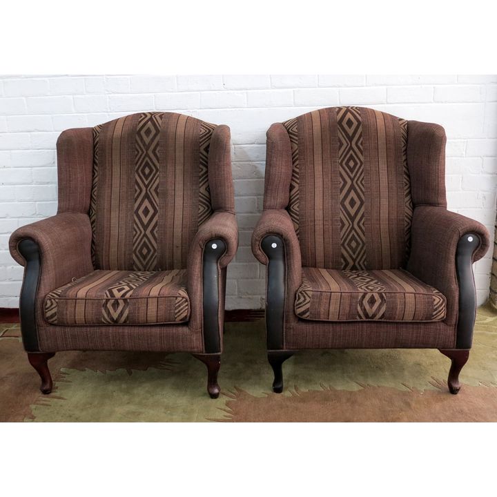 PAIR OF UPHOLSTERED WINGBACK CHAIRS