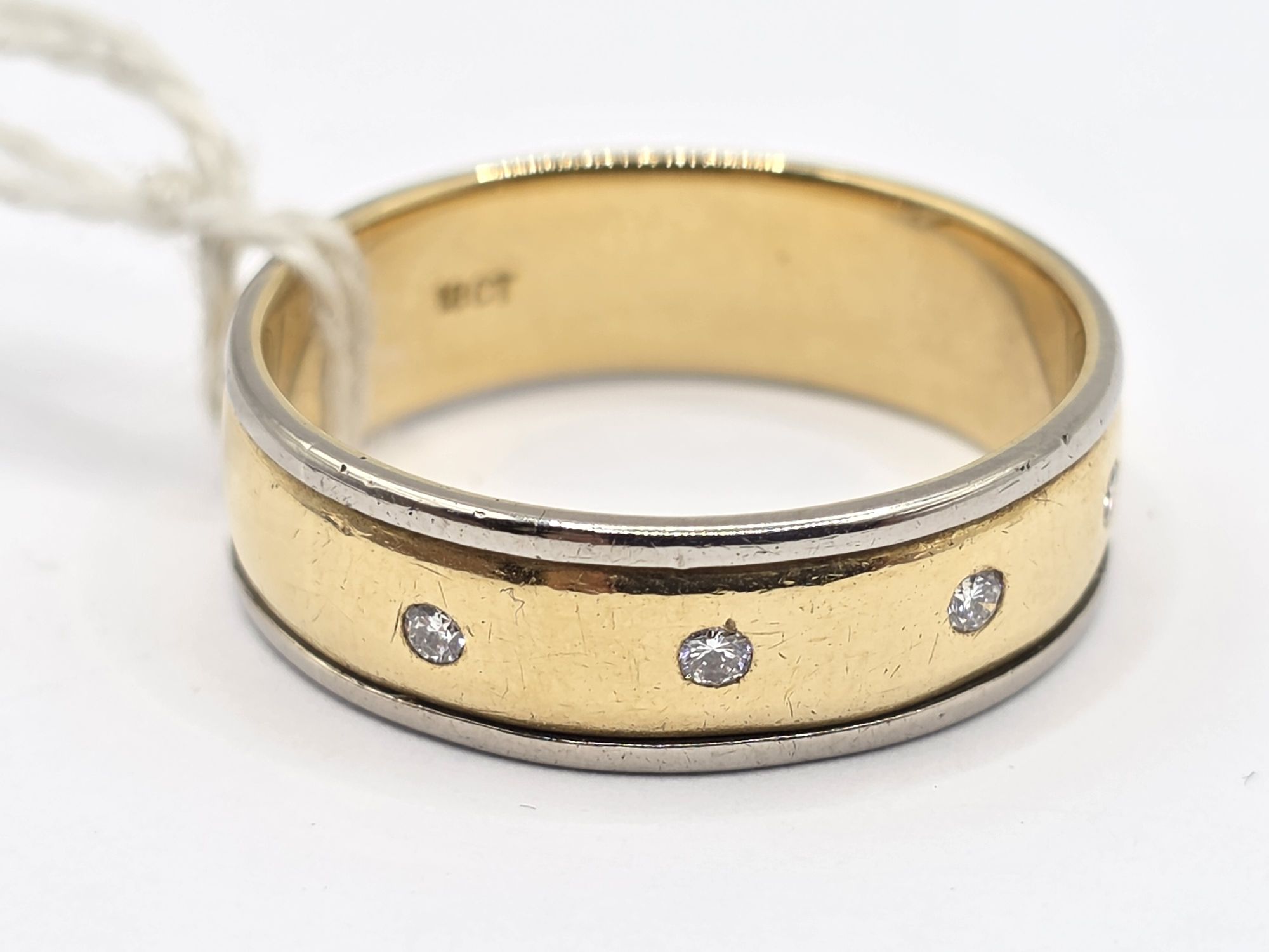 239 · 18CT GENTS DIAMOND WEDDER