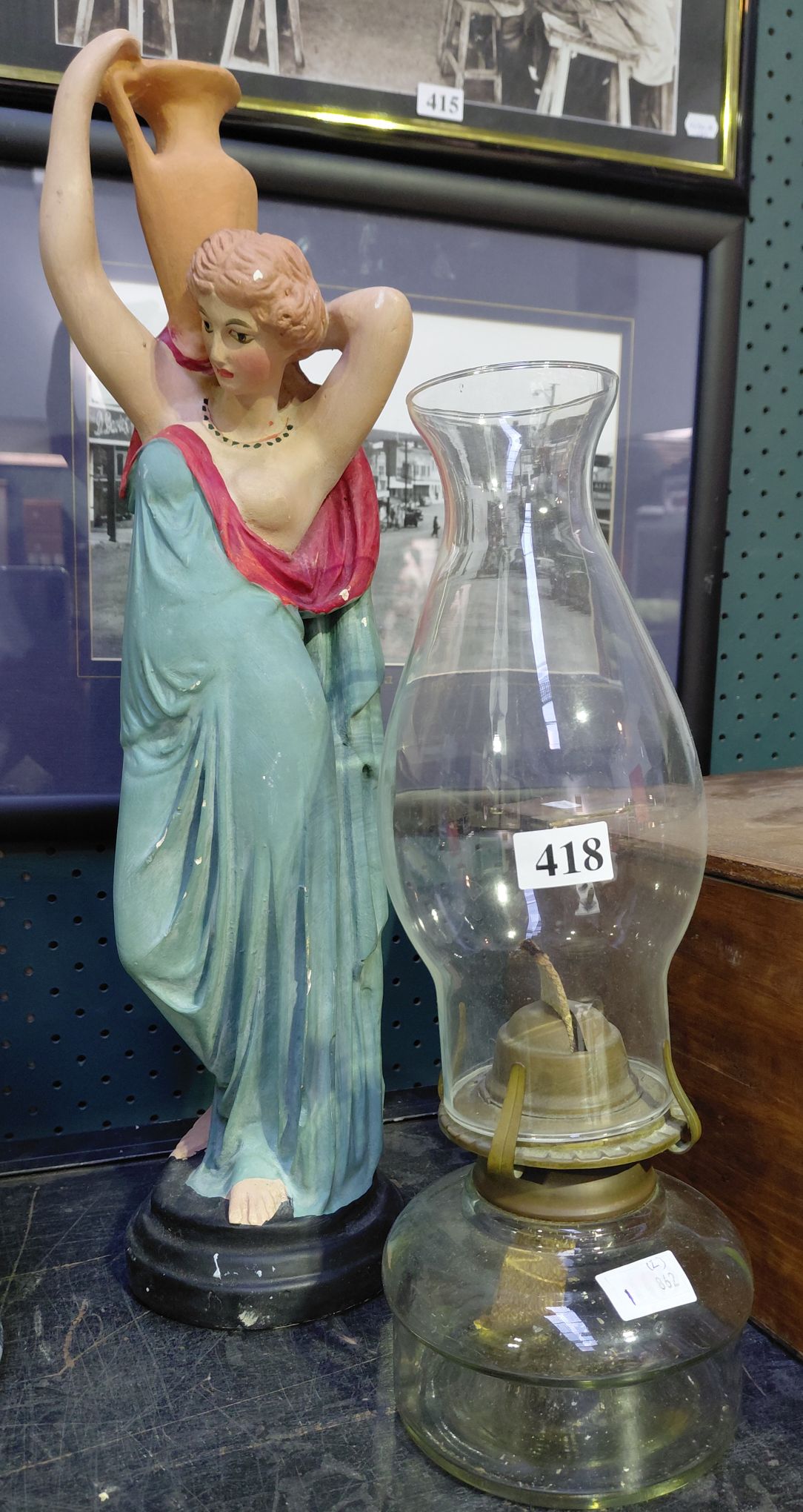 418 · PLASTER FIGURINE AND KEROSENE LAMP