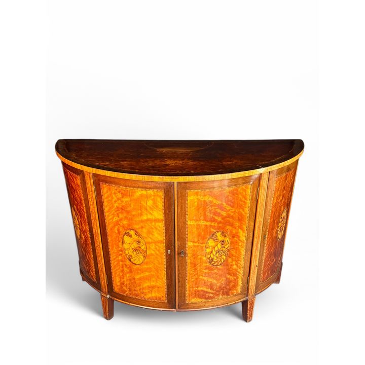 An important George III satinwood, marquetry and tulipwood banded demi-lune commode attributed to Gi