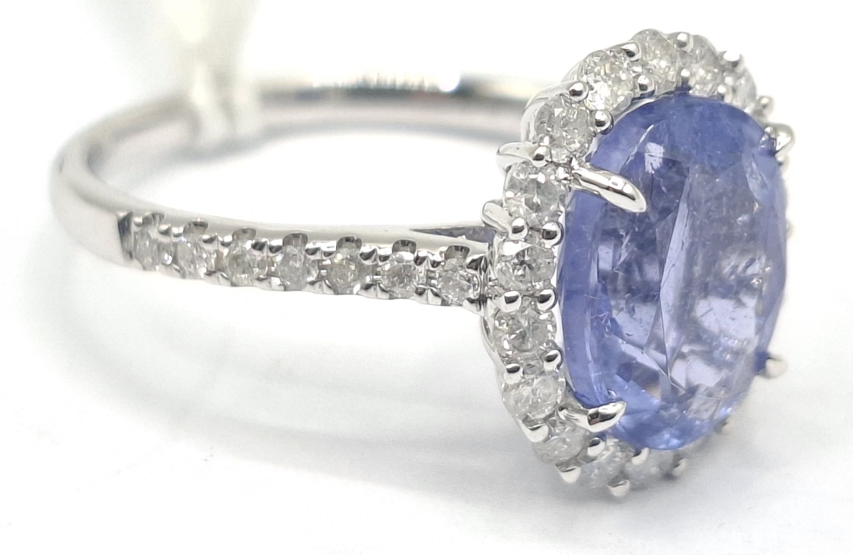 1153 · 14K WHITE GOLD TANZANITE HALO RING