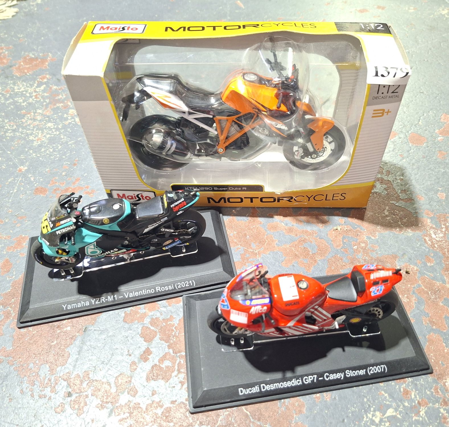 Three Toy Model Motorcycles