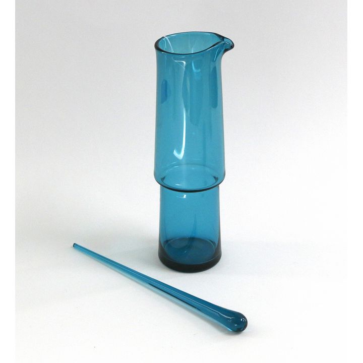 A vintage Scandinavian aquamarine glass jug and stirrer