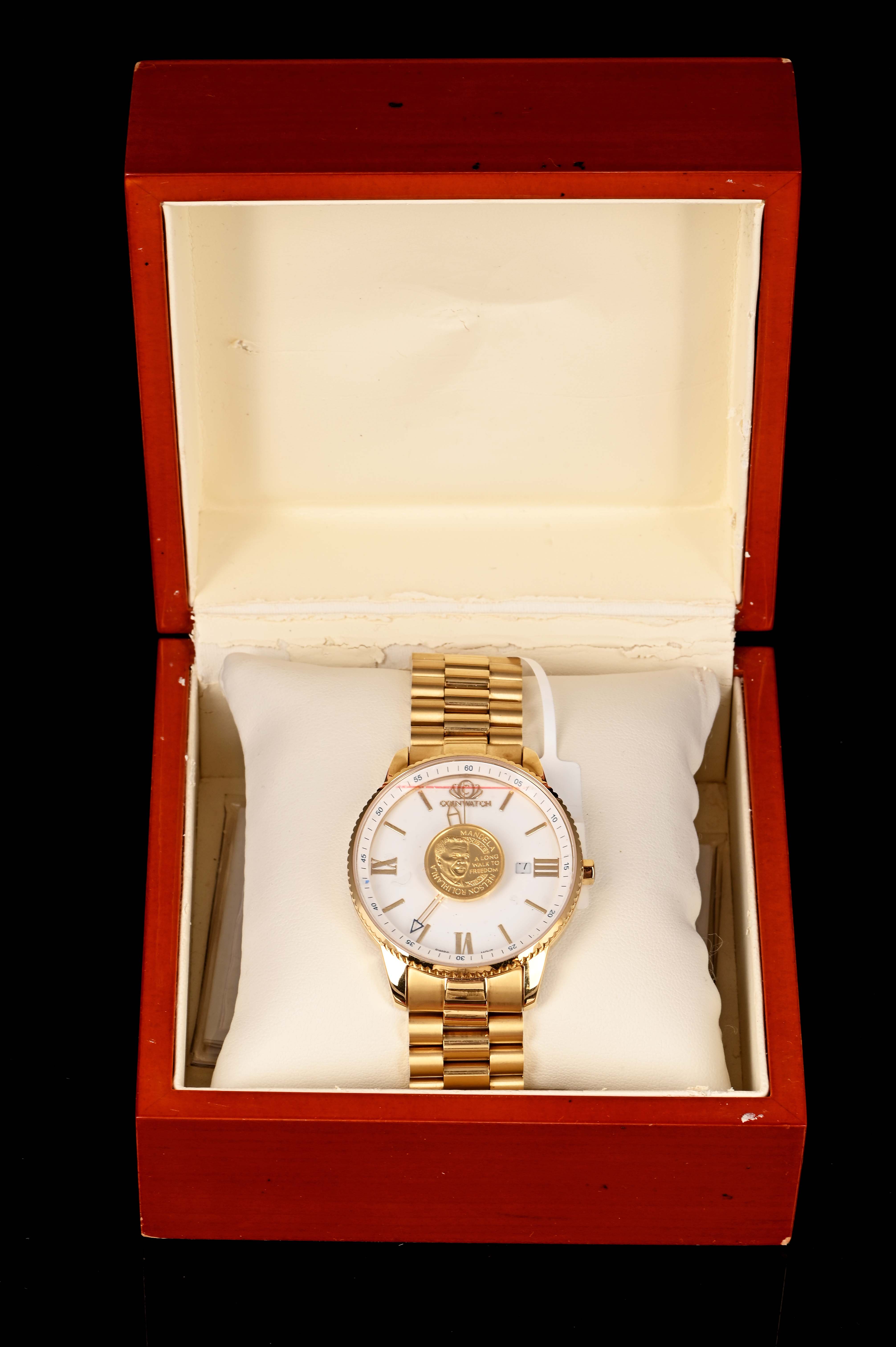 Gents Mandela coin watch, case material gold-tone stainless steel