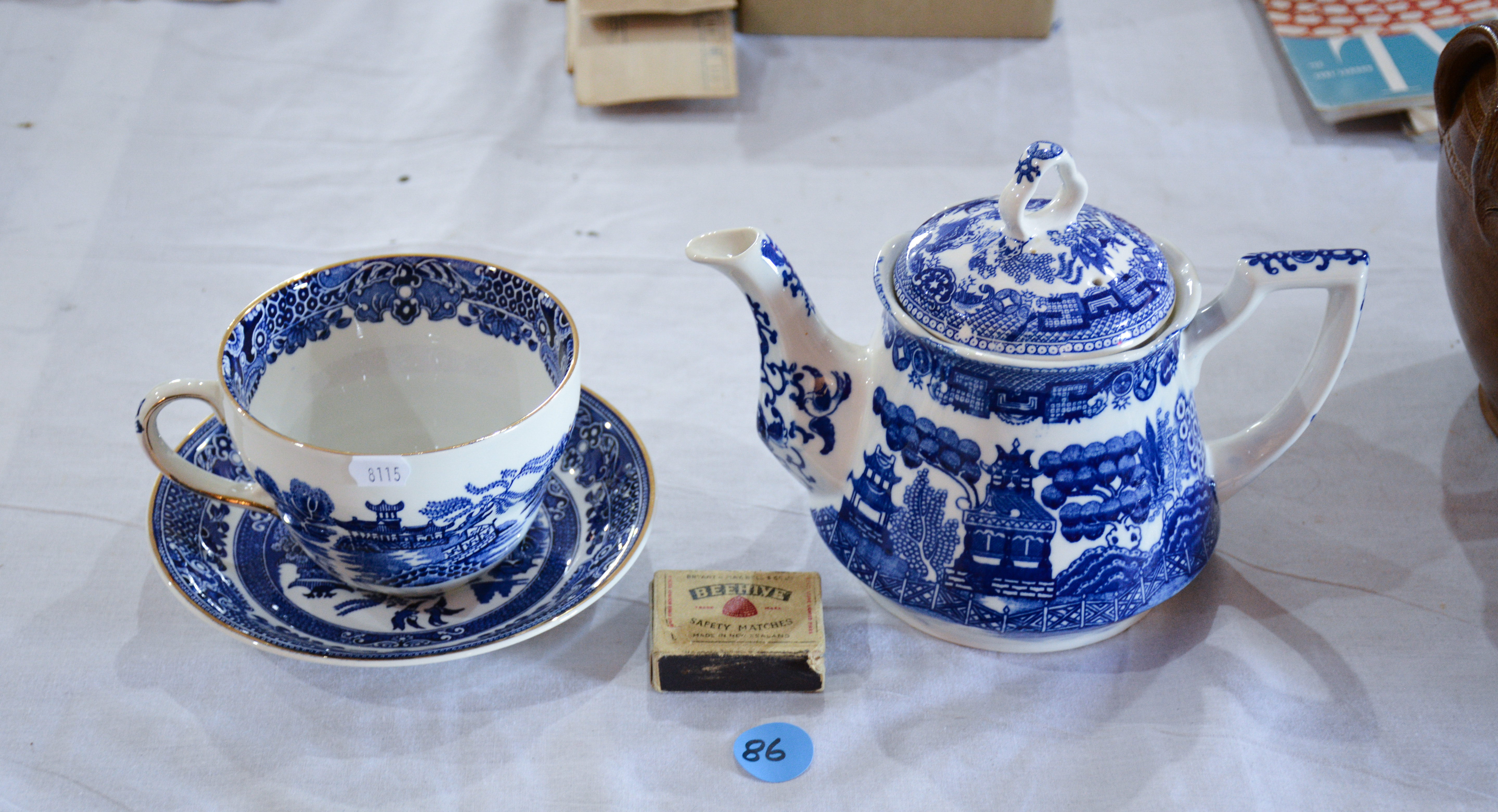Blue and White Teapot plus Cup and Saucer — sold at auction in New Zealand for $10