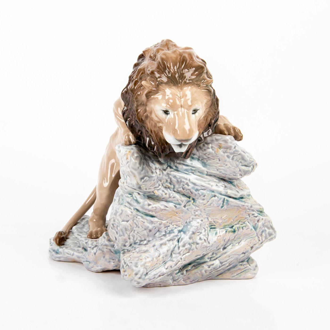 Lion Pouncing Porcelain Sculpture