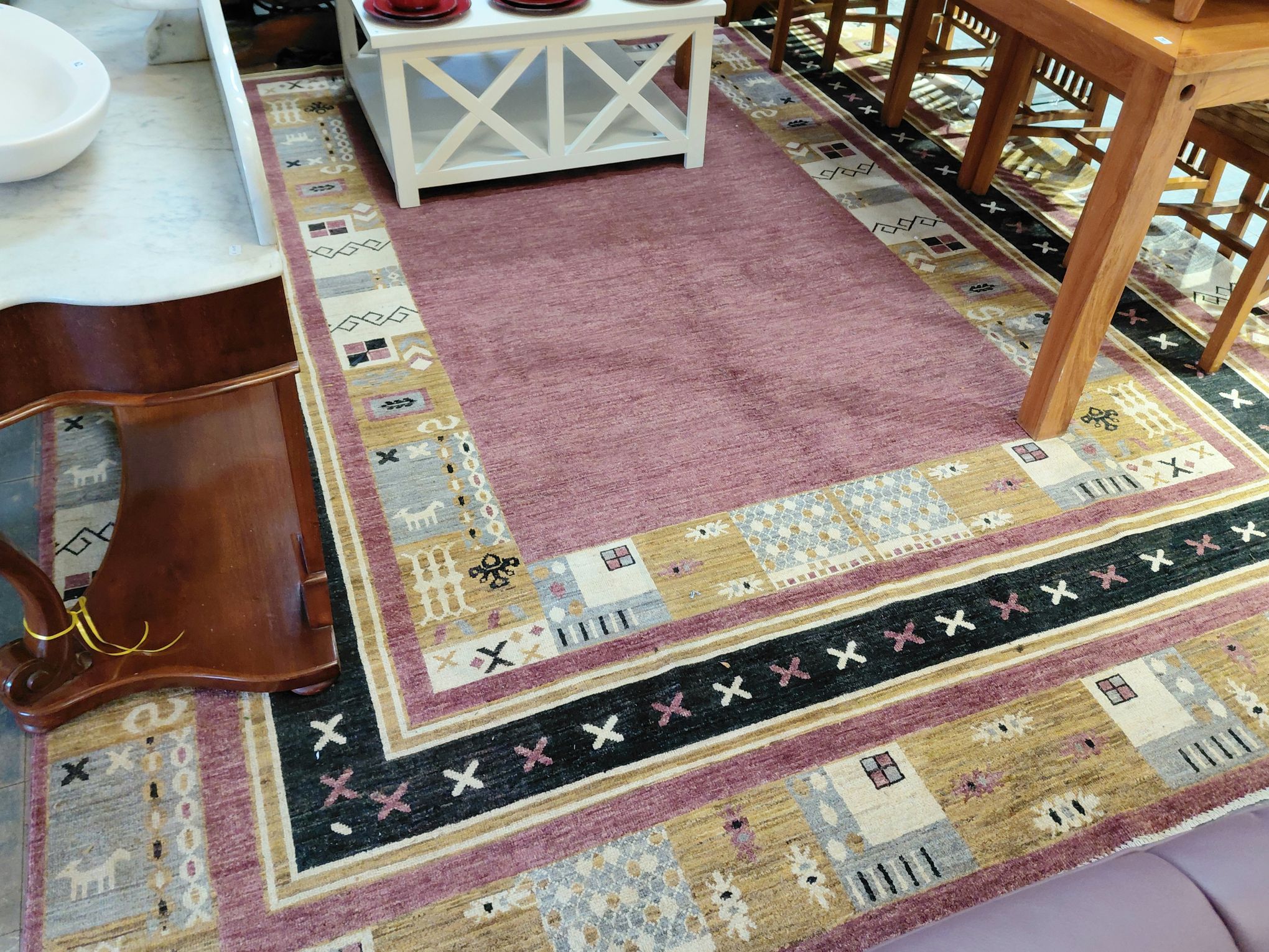 60 · LARGE TRIBAL RUG