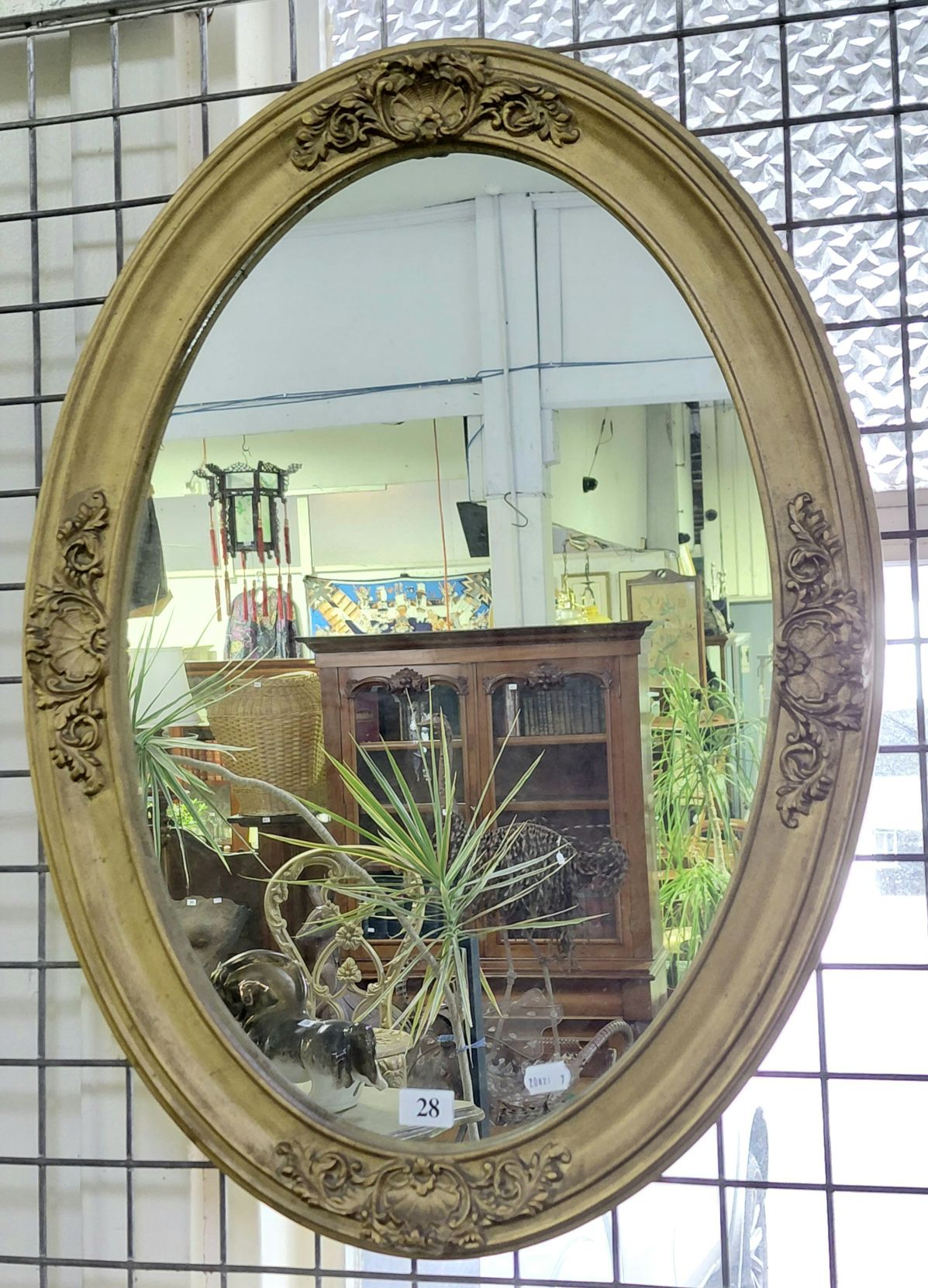 28 · OVAL WALL MIRROR