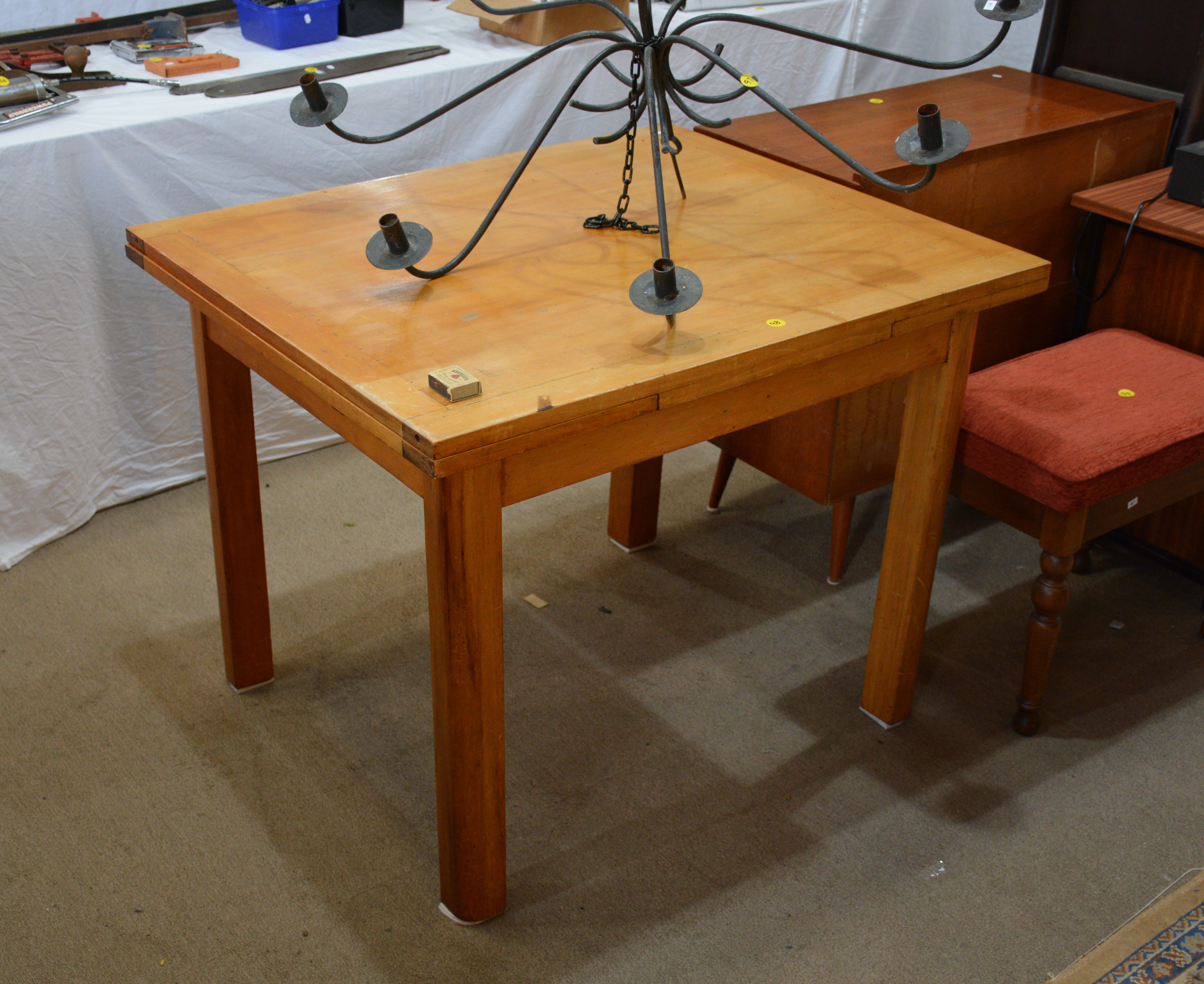 Extendable Wooden Table — sold at auction in New Zealand for $50