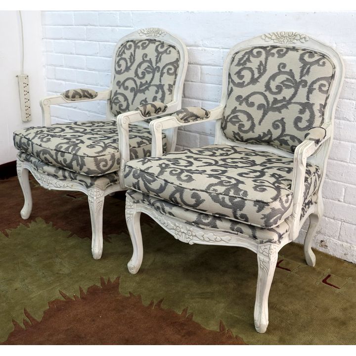 PAIR OF OPEN ARMCHAIRS