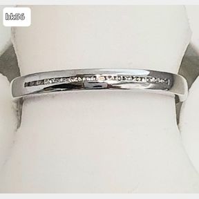 WHITE GOLD ETERNITY BAND WITH 15 BLACK DIAMONDS