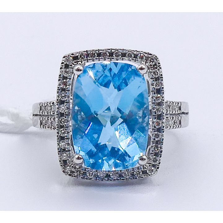 Ladies 14k Blue Topaz & Diamond Ring Size 7