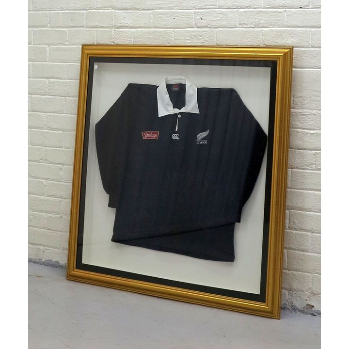 FRAMED ALL BLACK RUGBY JERSEY, signed indistinctly